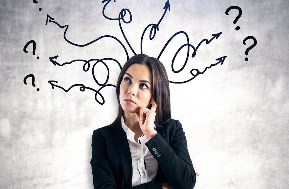 Portrait of pretty businesswoman with arrows