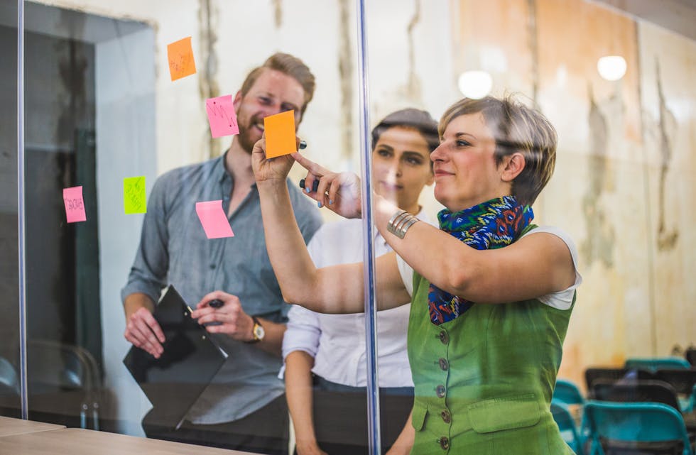 Young creative business people meeting at office