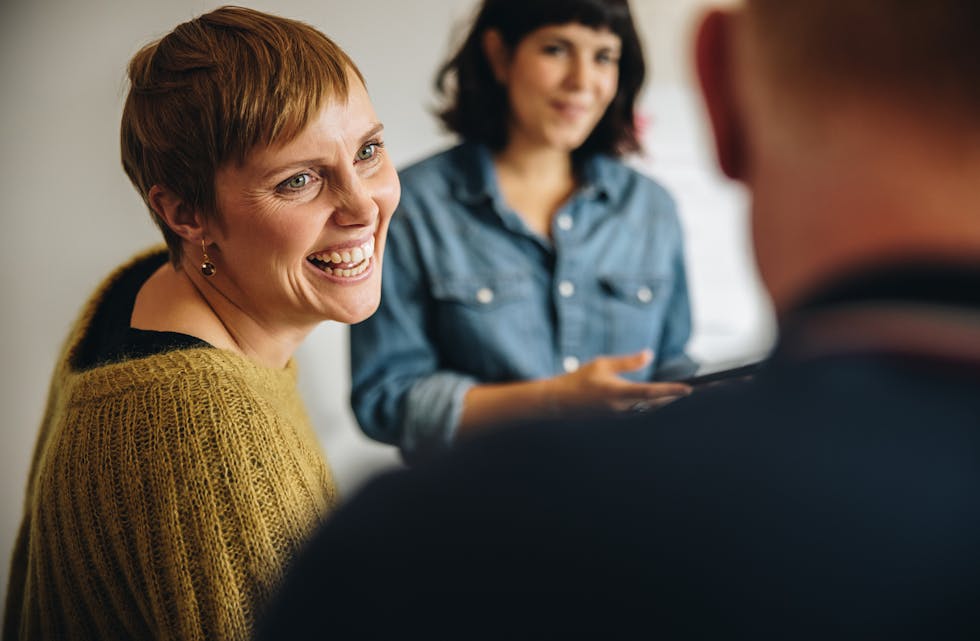 Businesswoman smiling during a meeting in office